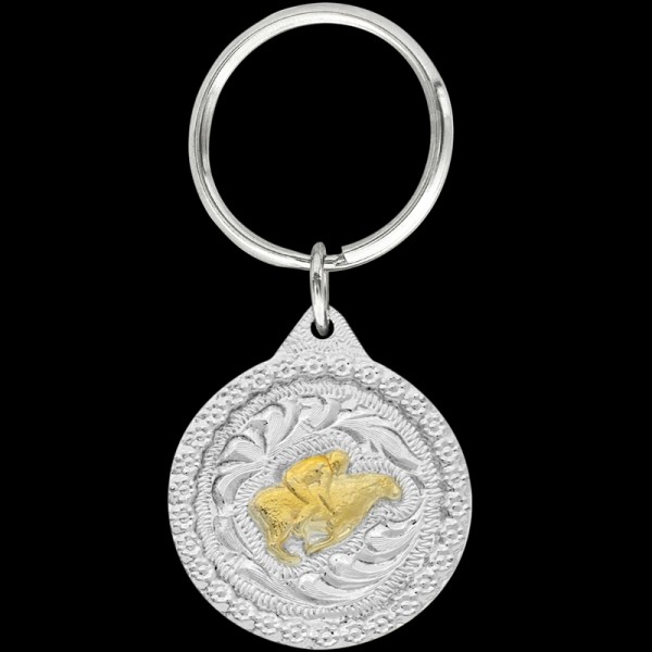 Gold Mutton Bustin, Perfect for your little cowboy or cowgirl! This keychain includes a beautiful berry border, a Mutton Busting 3D figure, and a key ring attachment. Each sil